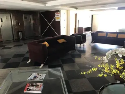 Uma área de estar em 203 Flat mobiliado vista mar Praia de Iracema