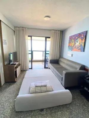 Uma cama ou camas num quarto em VISTA deslumbrante Avenida Beira Mar Meireles Mucuripe