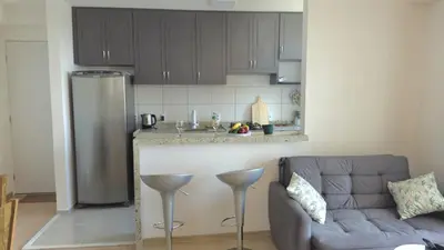 A cozinha ou kitchenette de Appartement tout confort au bord de mer