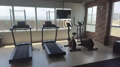 O centro de fitness e/ou as comodidades de fitness de Appartement tout confort au bord de mer