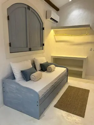 Uma cama ou camas num quarto em Vila Bento - Casas com conforto e sofisticação
