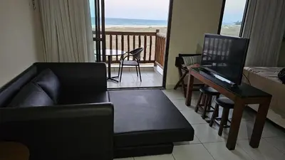 Uma área de estar em VG Sun Cumbuco by TP Flats