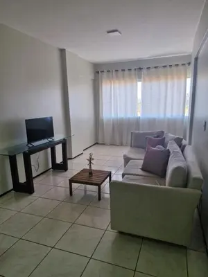 Uma televisão e/ou sistema de entretenimento em Apto Praia do Futuro 3 minutos da praia