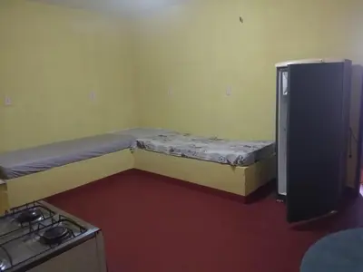 Uma cama ou camas num quarto em ICARAI CLUBE DE VERANEIO HOTEL E Turismo