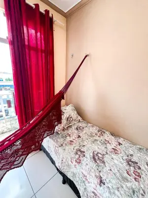 Uma cama ou camas num quarto em Flat Terra do Sol - Jijoca