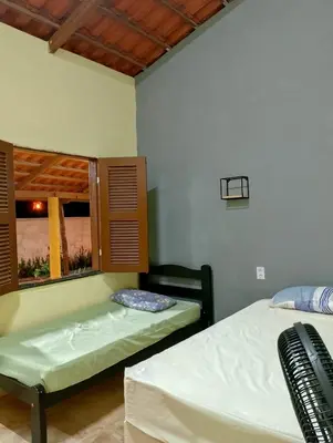 Uma cama ou camas num quarto em Deckraiosdesol