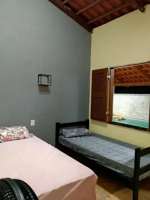 Uma cama ou camas num quarto em Deckraiosdesol