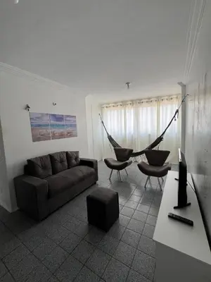 Uma área de estar em Apartamento Praia do Futuro, Fortaleza