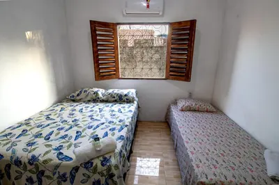 Uma cama ou camas num quarto em Casa Caminho das Dunas - Refúgio entre as Dunas e o Mar