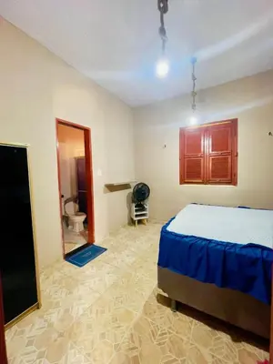 Uma cama ou camas num quarto em Jfhouse beach