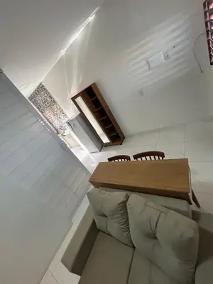 Uma área de estar em Residencial Salinas