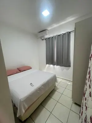 Uma cama ou camas num quarto em Apartamento completo