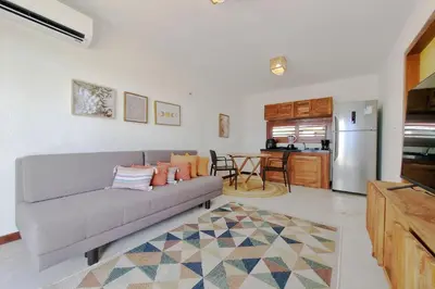 A cozinha ou kitchenette de The Point Bangalô Pé na Areia em Fortim By Carpediem
