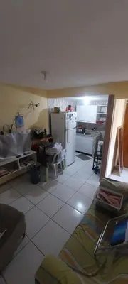 Uma área de estar em Apartamento na Praia do futuro