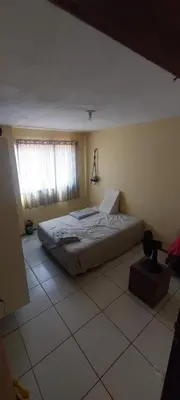 Uma cama ou camas num quarto em Apartamento na Praia do futuro