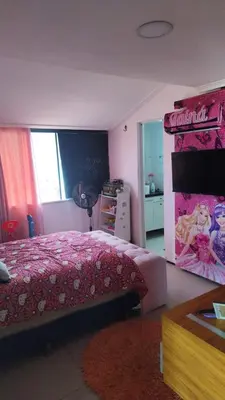 Uma cama ou camas num quarto em Cobertura Praia do Futuro