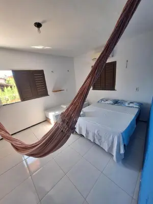 Uma cama ou camas num quarto em Pousada São João