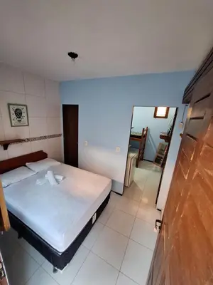 Uma cama ou camas num quarto em Pousada São João