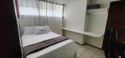 Uma cama ou camas num quarto em recanto da Juliana