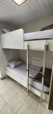 Uma ou mais camas em beliche num quarto em recanto da Juliana