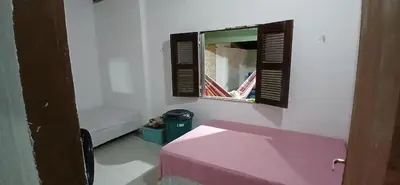 Uma cama ou camas num quarto em Casa com Piscina em Morro Branco, Beberibe - Ce