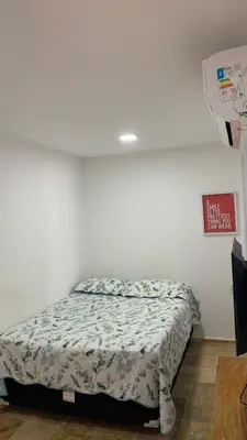 Uma cama ou camas num quarto em Vila solar