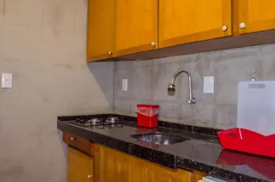 A cozinha ou kitchenette de Vila Lua Aparts - Apartamento 4