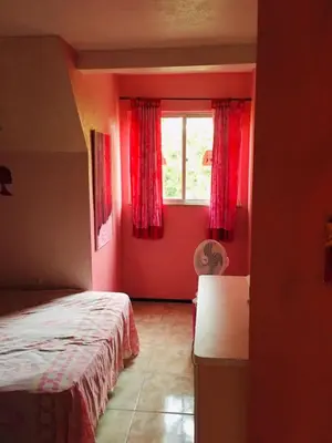 Uma cama ou camas num quarto em Casa da Barbie da Serra