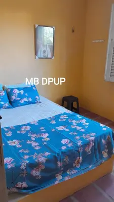 Uma cama ou camas num quarto em Casa com Piscina na Praia do Morro Branco