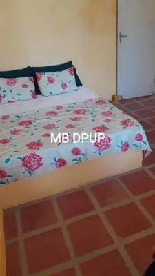 Uma cama ou camas num quarto em Casa com Piscina na Praia do Morro Branco