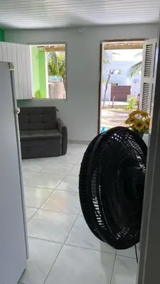 Uma área de estar em Casa da orla
