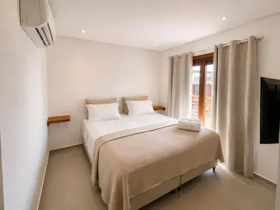 Uma cama ou camas num quarto em Apartamento Messina - Grupo Messina