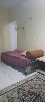 Uma cama ou camas num quarto em Casa de temporada Fortaleza