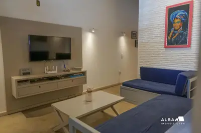 Uma televisão e/ou sistema de entretenimento em Casa Minerva Pontal