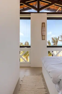 Uma cama ou camas num quarto em Kitesurfing Paradise, Beautiful Beach House