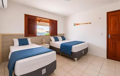 Uma cama ou camas num quarto em Casa Porto das Dunas