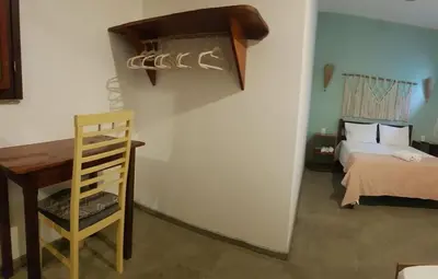 Uma cama ou camas num quarto em Vila Lua Aparts - Apartamento 2