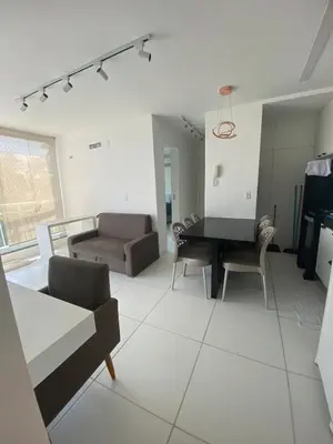 Uma área de estar em CN Porto das Dunas Beach
