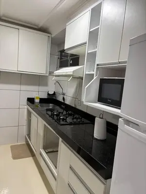 A cozinha ou kitchenette de Central apartamento Flor de Cheiro