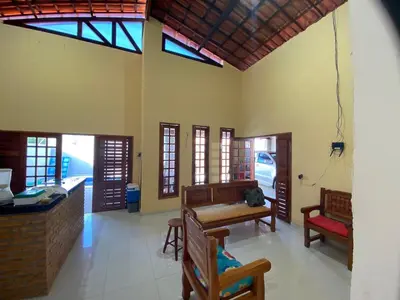 Uma área de estar em Casa com piscina beberibe