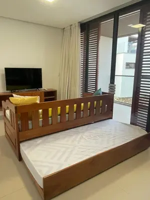 Uma cama ou camas num quarto em Loft Charmoso com Rooftop no Vila das Dunas
