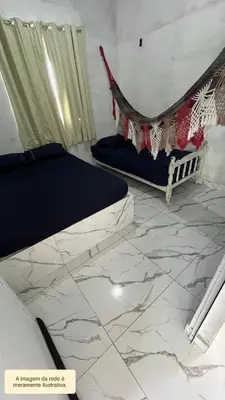 Uma cama ou camas num quarto em Casa de praia em Paracuru - Ceará - arejada com piscina