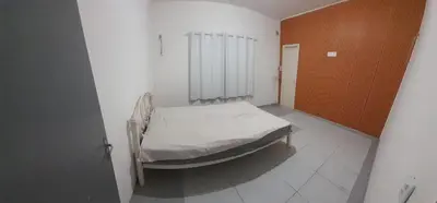 Uma cama ou camas num quarto em Casa de veraneio