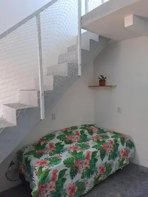 Uma cama ou camas num quarto em Vista Mar Emboaca