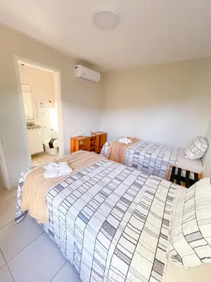 Uma cama ou camas num quarto em Praimar