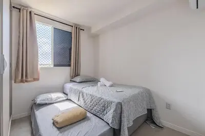 Uma cama ou camas num quarto em Mirante #807 - Praia do Futuro por Carpediem