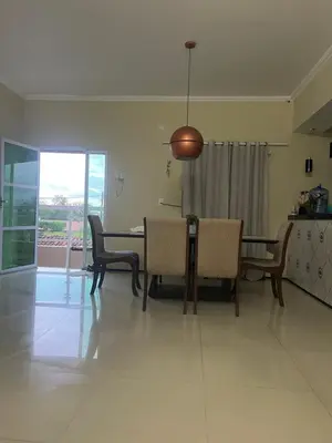 Uma área de estar em Casa da mae