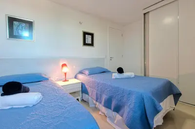 Uma cama ou camas num quarto em Breezes do cumbuco