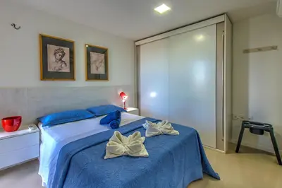 Uma cama ou camas num quarto em Breezes do cumbuco