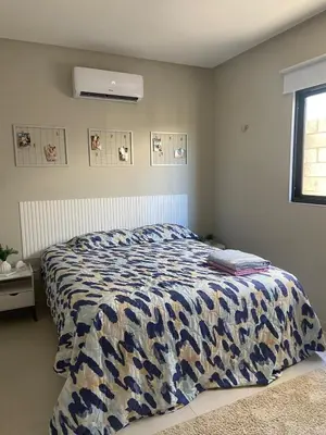 Uma cama ou camas num quarto em Casa Tibau